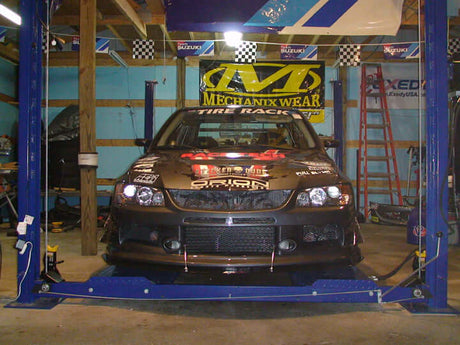 APR Carbon Fiber Wind Splitter With Rods - Mitsubishi EVO 9 2006 - 2007