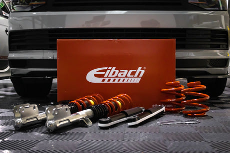 Eibach Pro-Street-S Coilovers for VW Transporter T6 displayed on a clean background, showcasing stainless steel design and height adjustments.