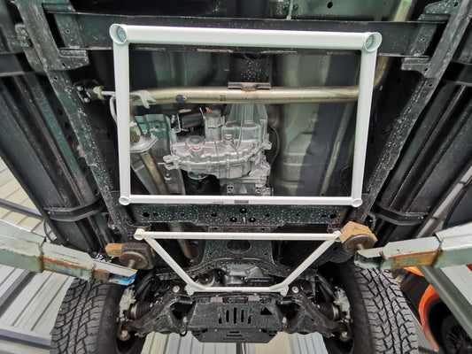 Ultra Racing Nissan Navara D23 Mid Lower Bar | 4-Point Chassis Brace