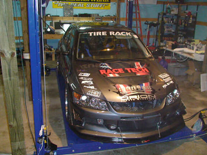 APR Carbon Fiber Wind Splitter With Rods - Mitsubishi EVO 9 2006 - 2007