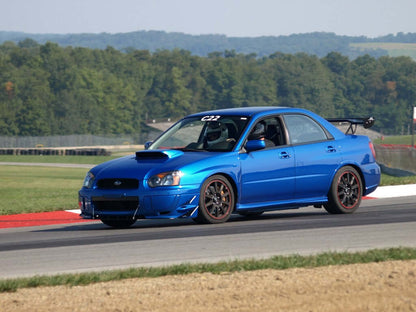 APR Carbon Fiber Wind Splitter With Rods - Subaru WRX/STI 2004 - 2005